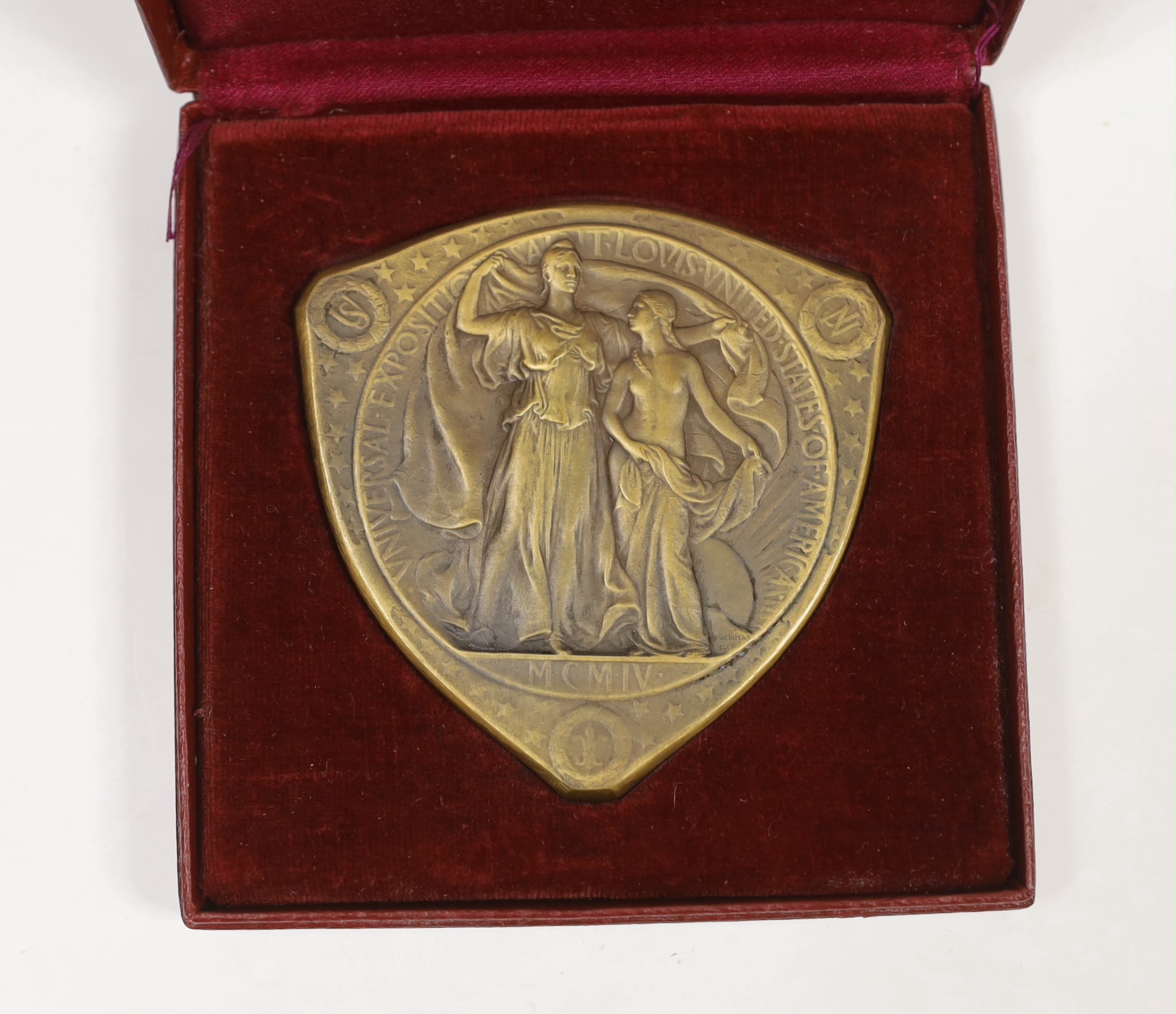 Commemorative medals, St Louis Universal Exposition 1904 bronze medal, in case of issue with citation scroll awarded to Joseph H Mott as collaborator with Doulton and company Ltd and accompanying letter.